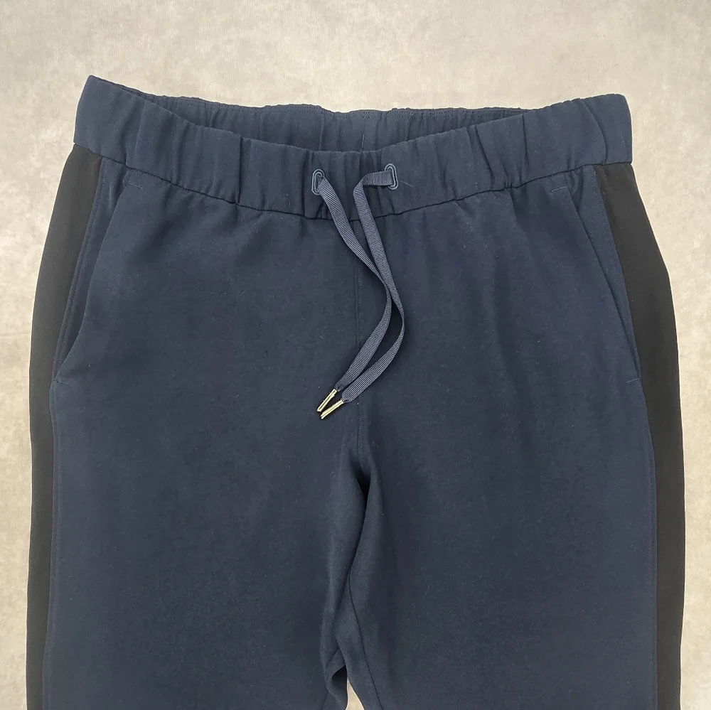 Lululemon Athletica On the Fly Woven Navy with Black Track Stripe Pants